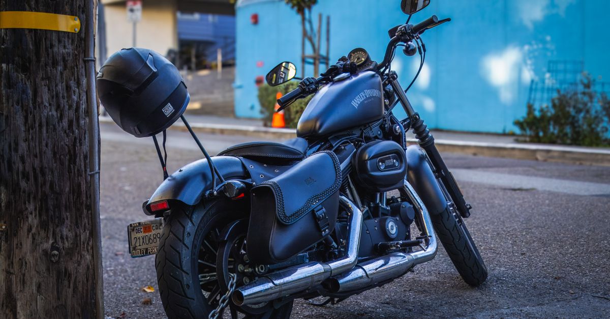 Kettingspray aanbrengen op een motorketting